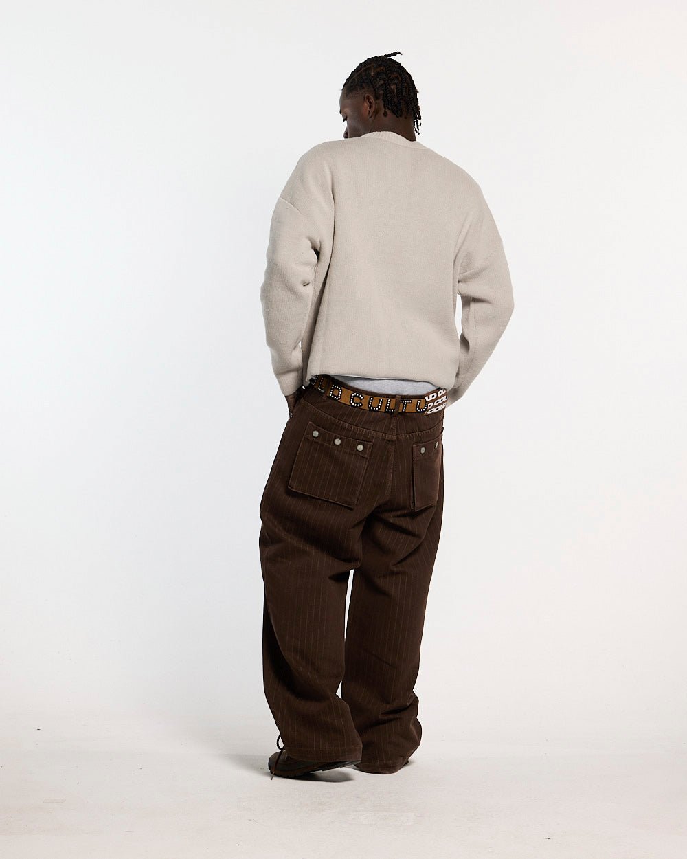 GRUBBY KNIT GREY - light grey script knit sweater, back view on male model - Cold Culture #man