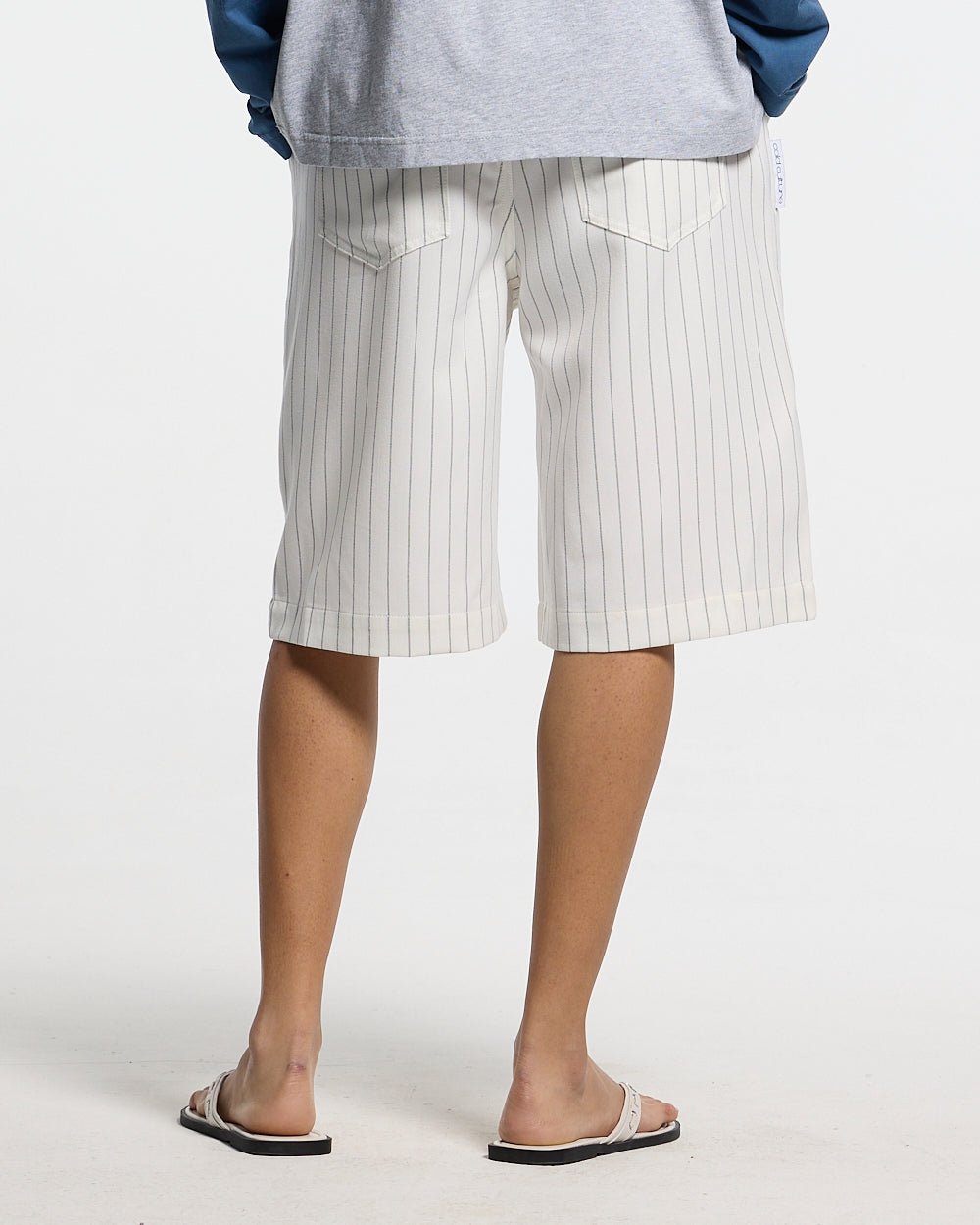 HARBOR JORTS WHITE - white pinstriped shorts, back view on male model - Cold Culture