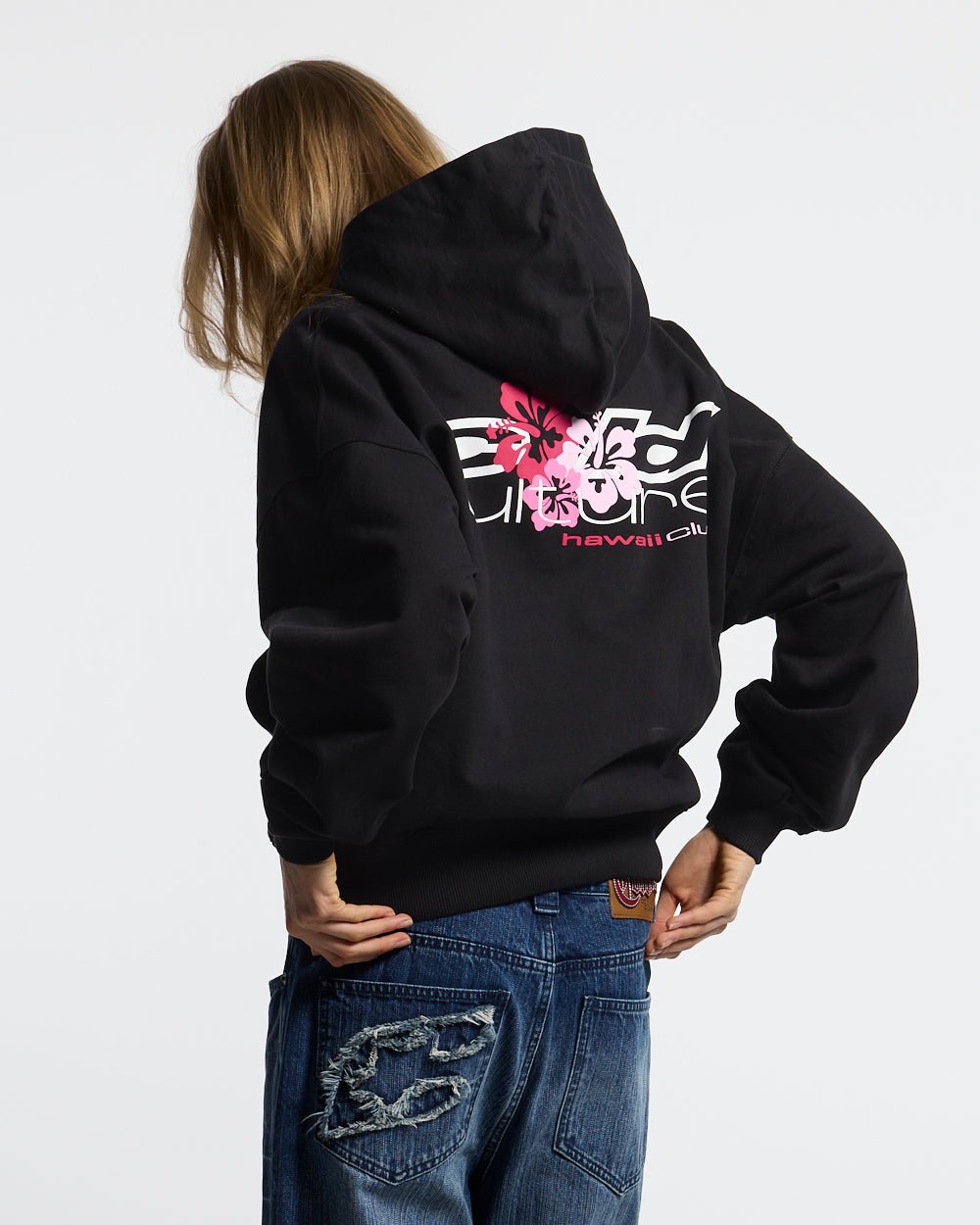 HAWAII CLUB HOODIE BLACK - black graphic print hoodie, back view on female model - Cold Culture #woman