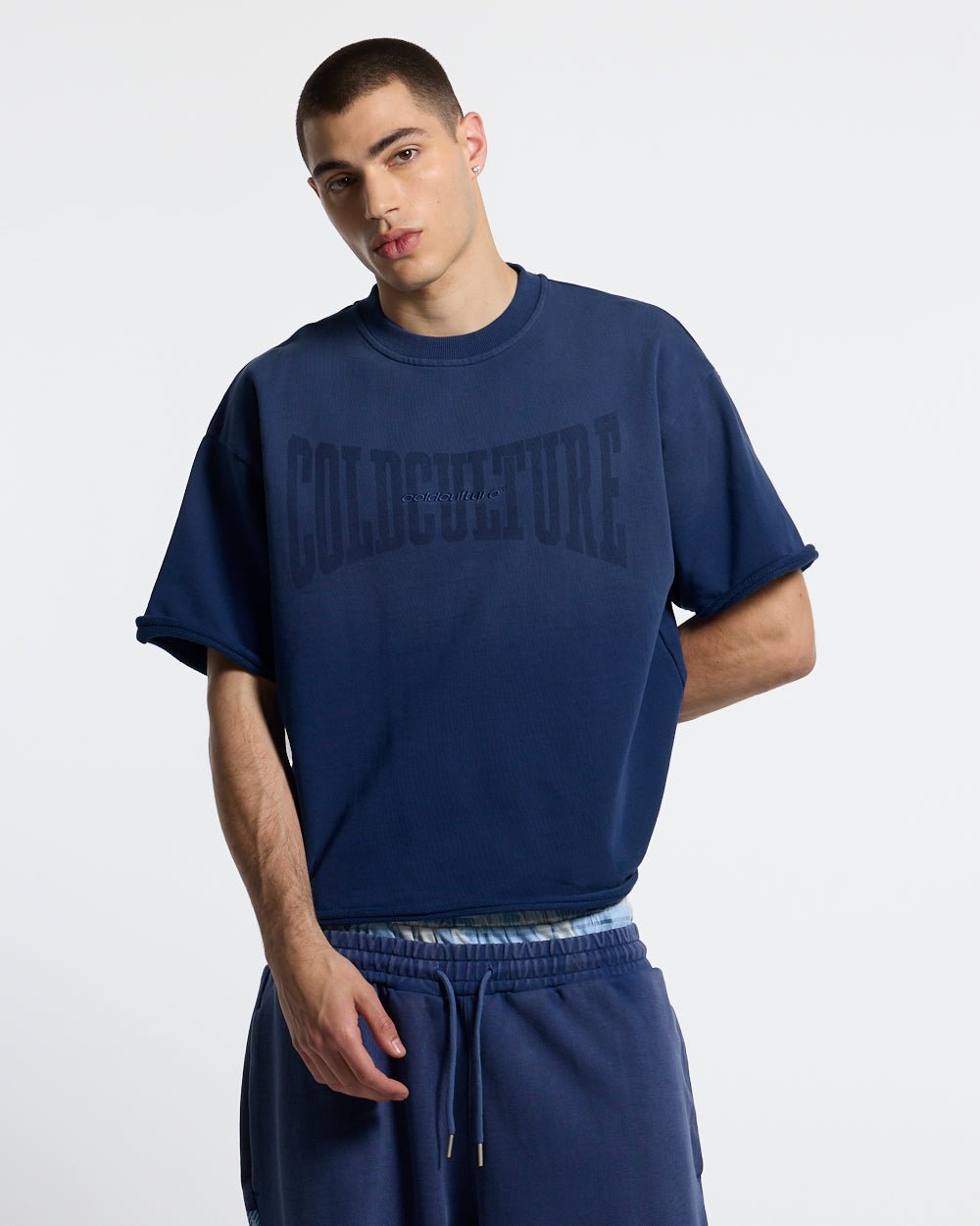 HIDE & SEEK TEE NAVY - navy oversized tee, front view on male model - Cold Culture #man