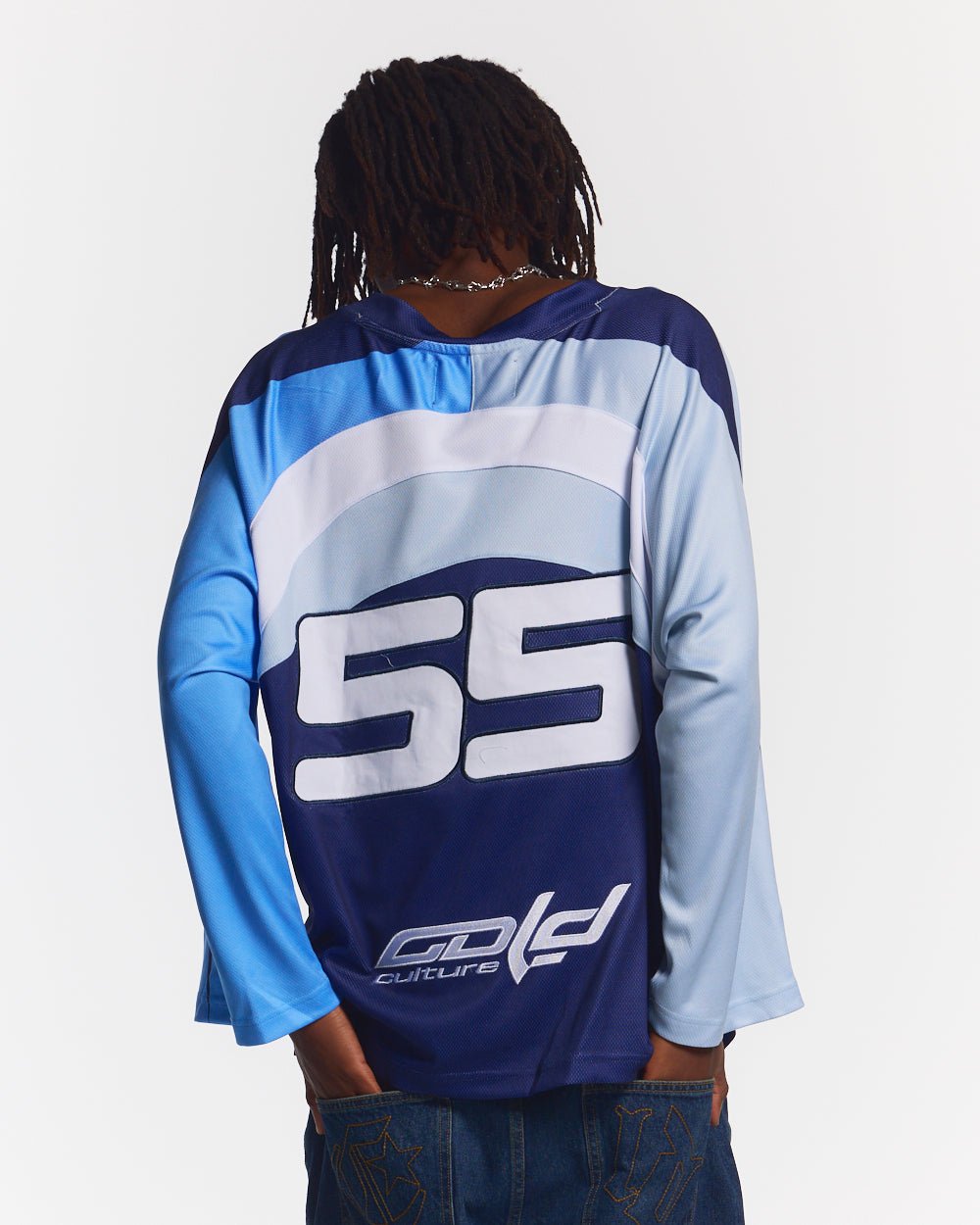 HOCKEY PLAYER LONGSLEEVE TEE NAVY/GLOSS BLUE - navy blue graphic print longsleeve tee, back view on male model - Cold Culture #man