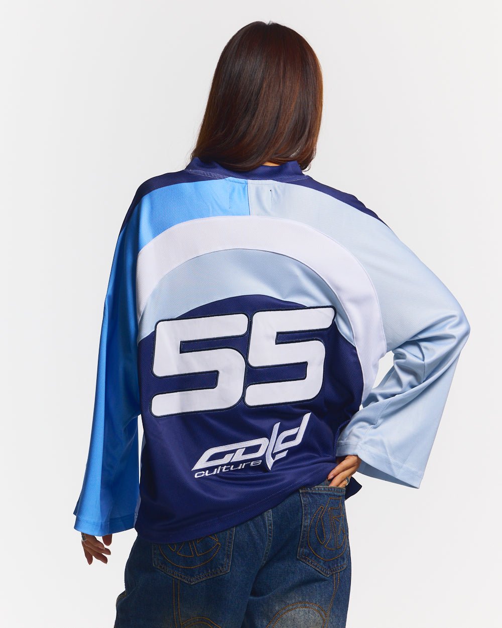 HOCKEY PLAYER LONGSLEEVE TEE NAVY/GLOSS BLUE - navy blue graphic print longsleeve tee, back view on female model - Cold Culture #woman
