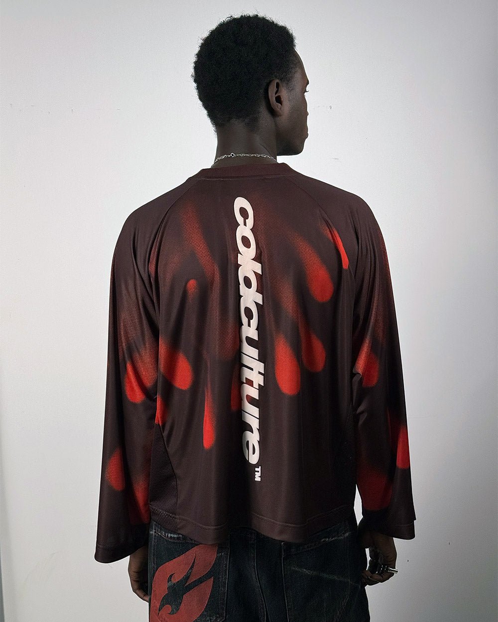 IGNITE LONGSLEEVE BLACK & RED - black and red printed longsleeve tee, back view on male model - Cold Culture #man