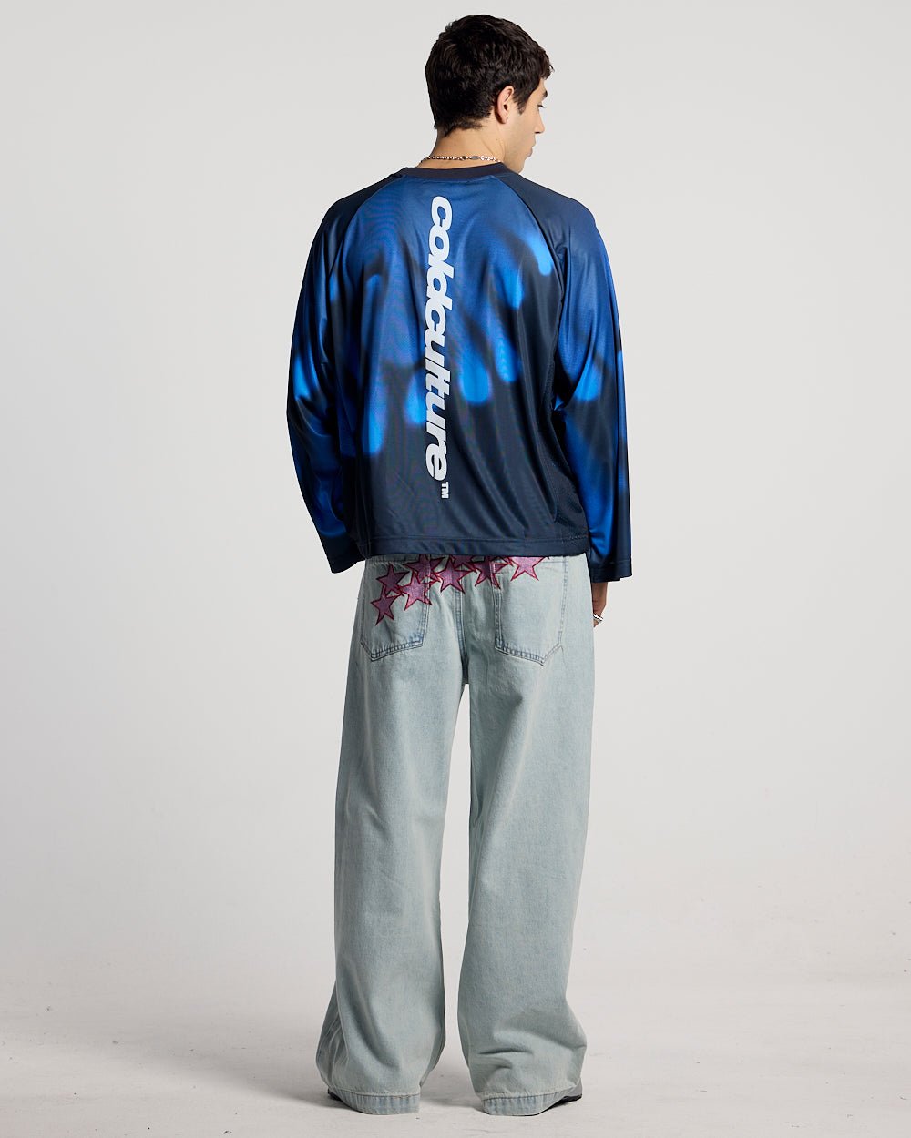 IGNITE LONGSLEEVE BLUE - blue printed longsleeve tee, back view on male model - Cold Culture #man