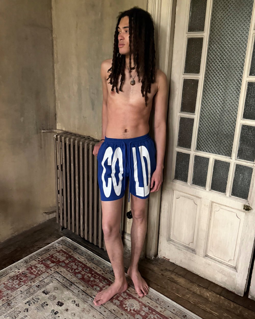 IMPACT SWIMWEAR BLUE - blue printed swim shorts, street style shot - Cold Culture