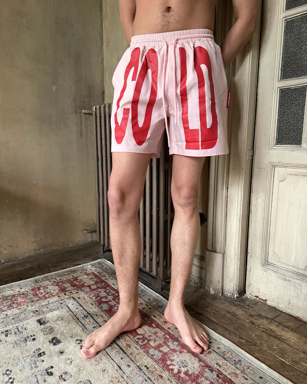 IMPACT SWIMWEAR PINK - pink printed swim shorts, worn detail - Cold Culture