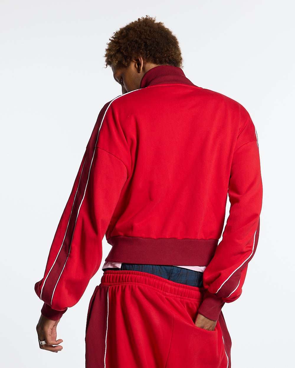 JET LAG JACKET RED - red and burgundy zip-up hoodie, back view on male model - Cold Culture #man