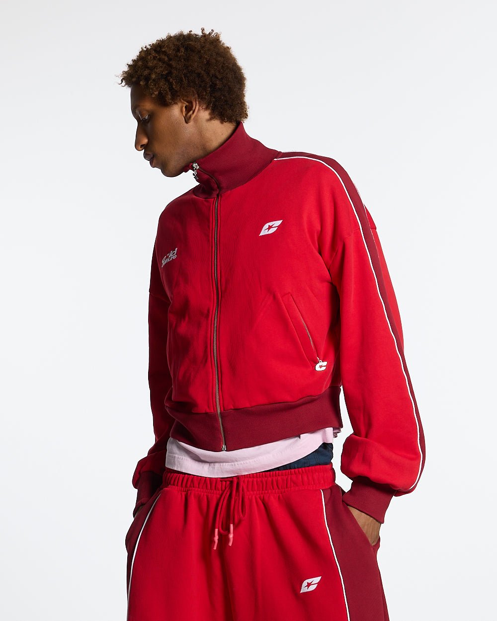 JET LAG JACKET RED - red and burgundy zip-up hoodie, front view on male model - Cold Culture #man