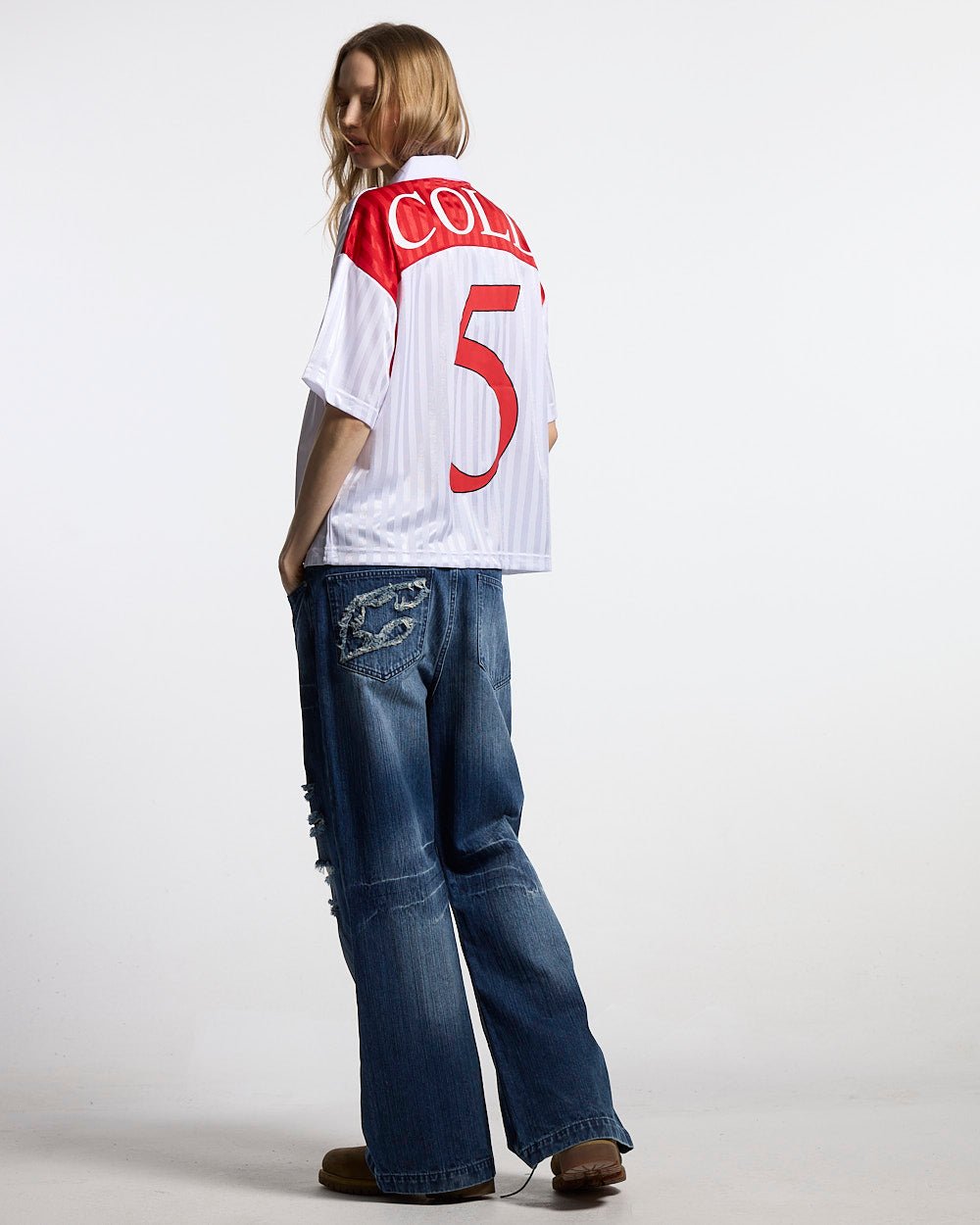 JR FOLKS POLO WHITE - white and red football polo, back view on female model - Cold Culture #woman