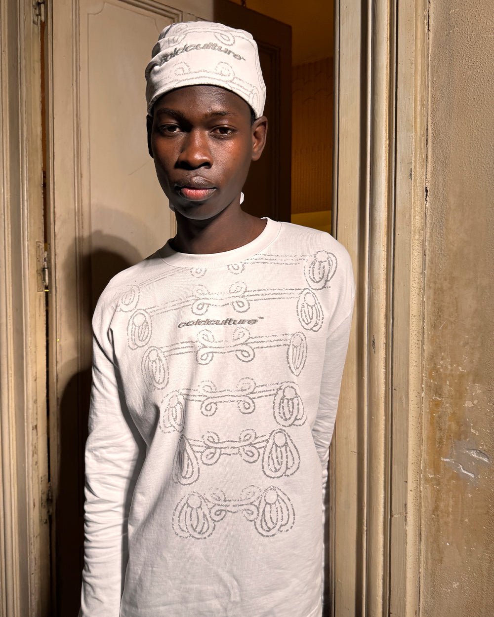 KNOTTING HILL LONGSLEEVE WHITE - white embroidered longsleeve tee, street style shot - Cold Culture