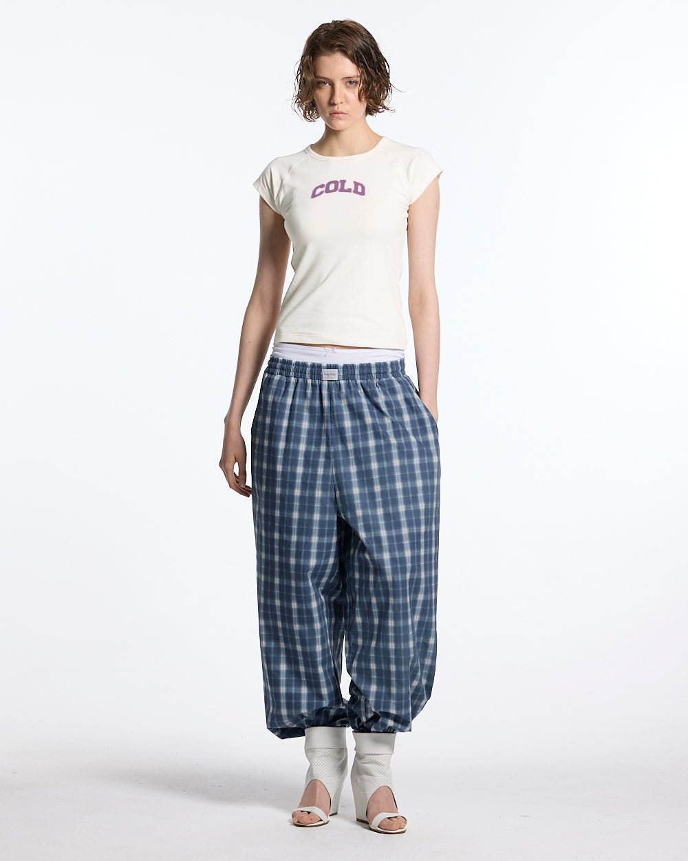 LITTLE BABY TEE WHITE - off-white graphic baby tee, front view on female model - Cold Culture #woman