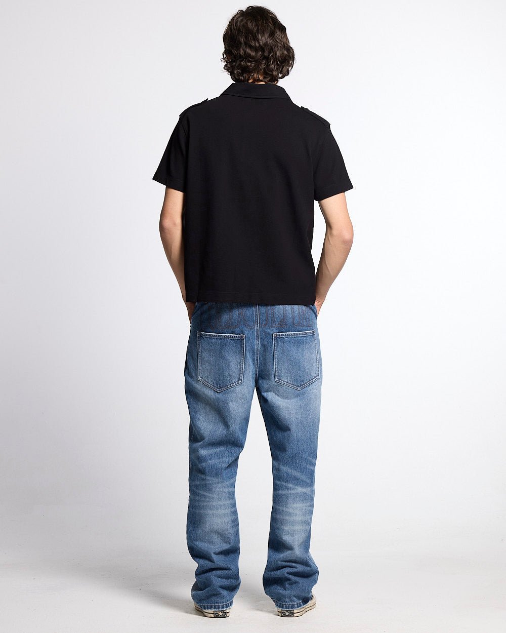 LOOPING POLO BLACK - black graphic print polo shirt, back view on male model - Cold Culture #man