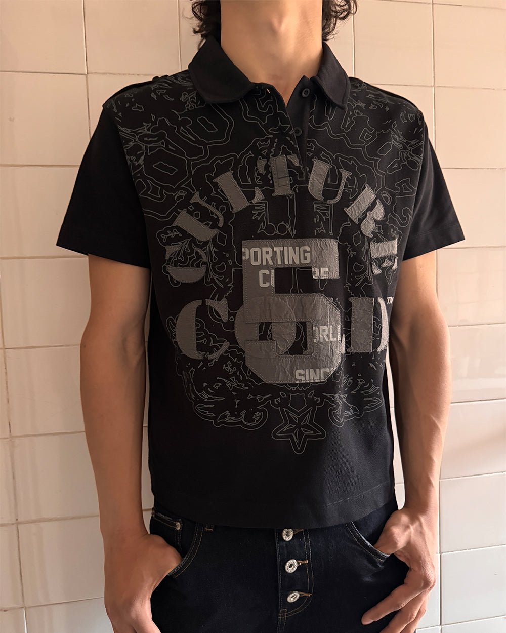 LOOPING POLO BLACK - black graphic print polo shirt, street style shot - Cold Culture