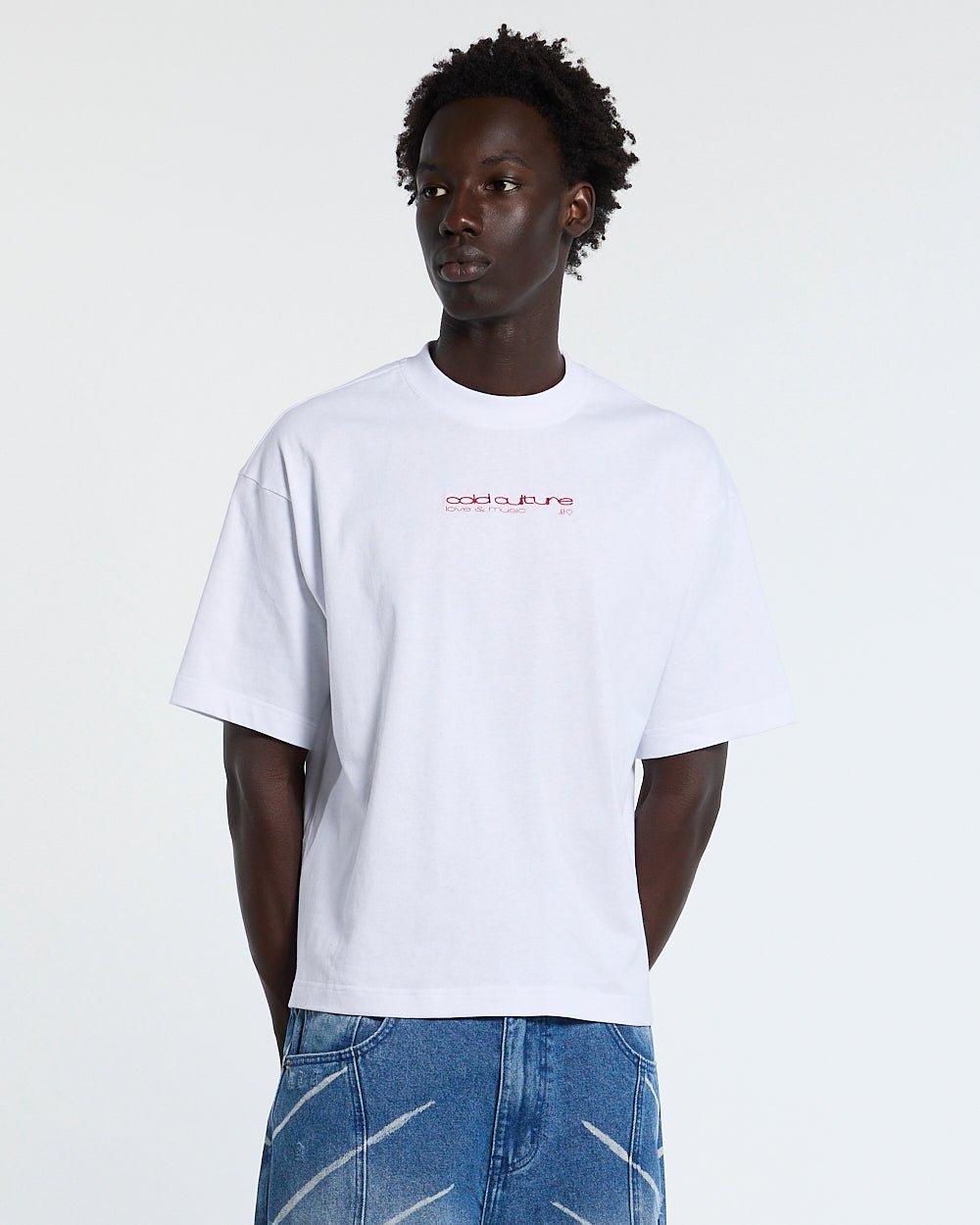 LOVEPODS TEE WHITE - white graphic print tee, front view on male model - Cold Culture #man