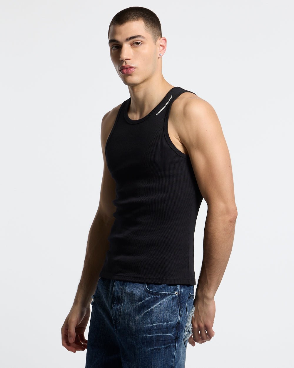 LOW KEY BASIC TANK TOP 2 PACK WHITE & BLACK - black and white ribbed tank tops, front view on male model - Cold Culture #man
