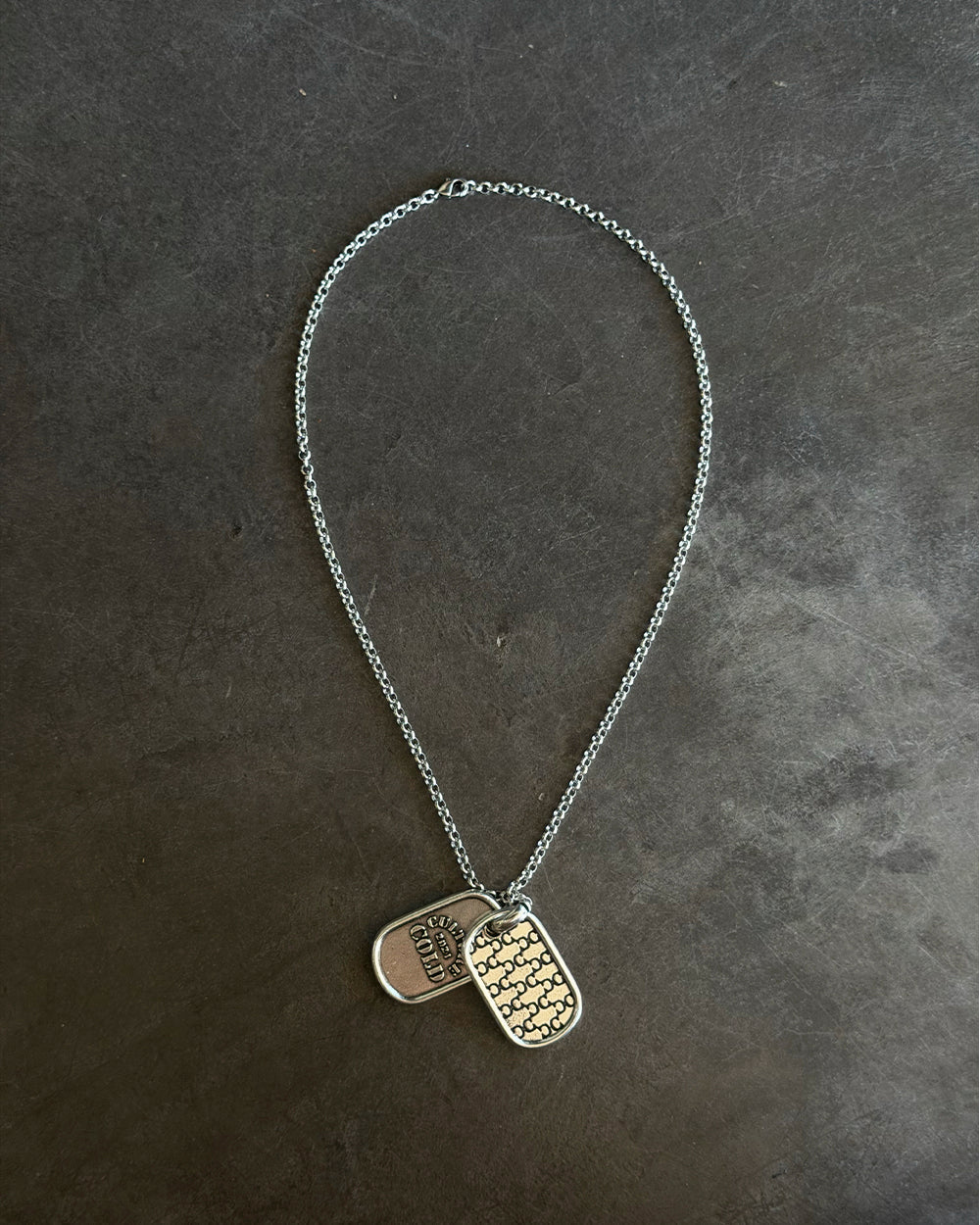MARINE CHAINS PENDANT SILVER - silver dog tag pendant necklace, flat lay - Cold Culture
