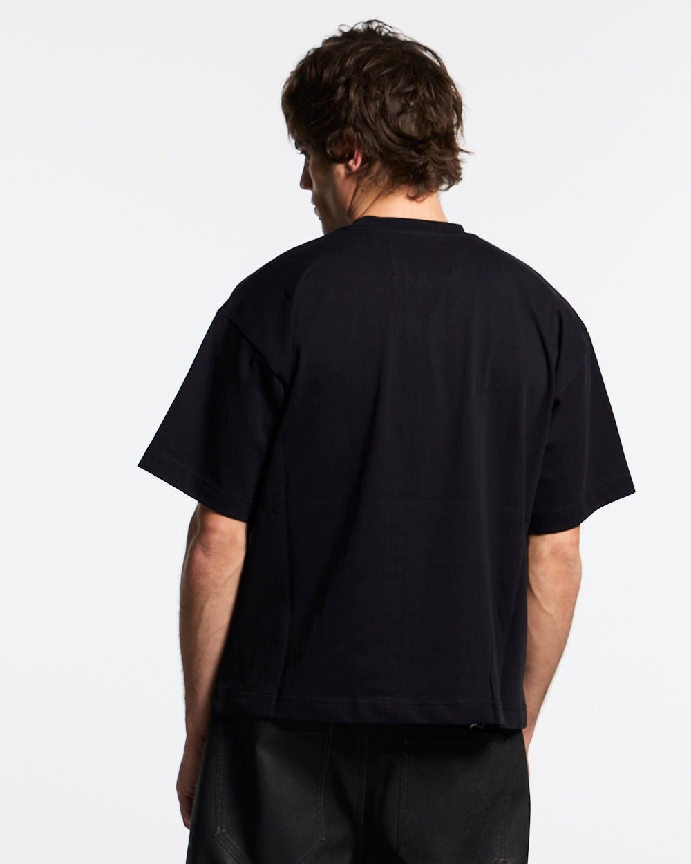 MR WORLDWIDE TEE BLACK - black graphic print tee, back view on male model - Cold Culture #man
