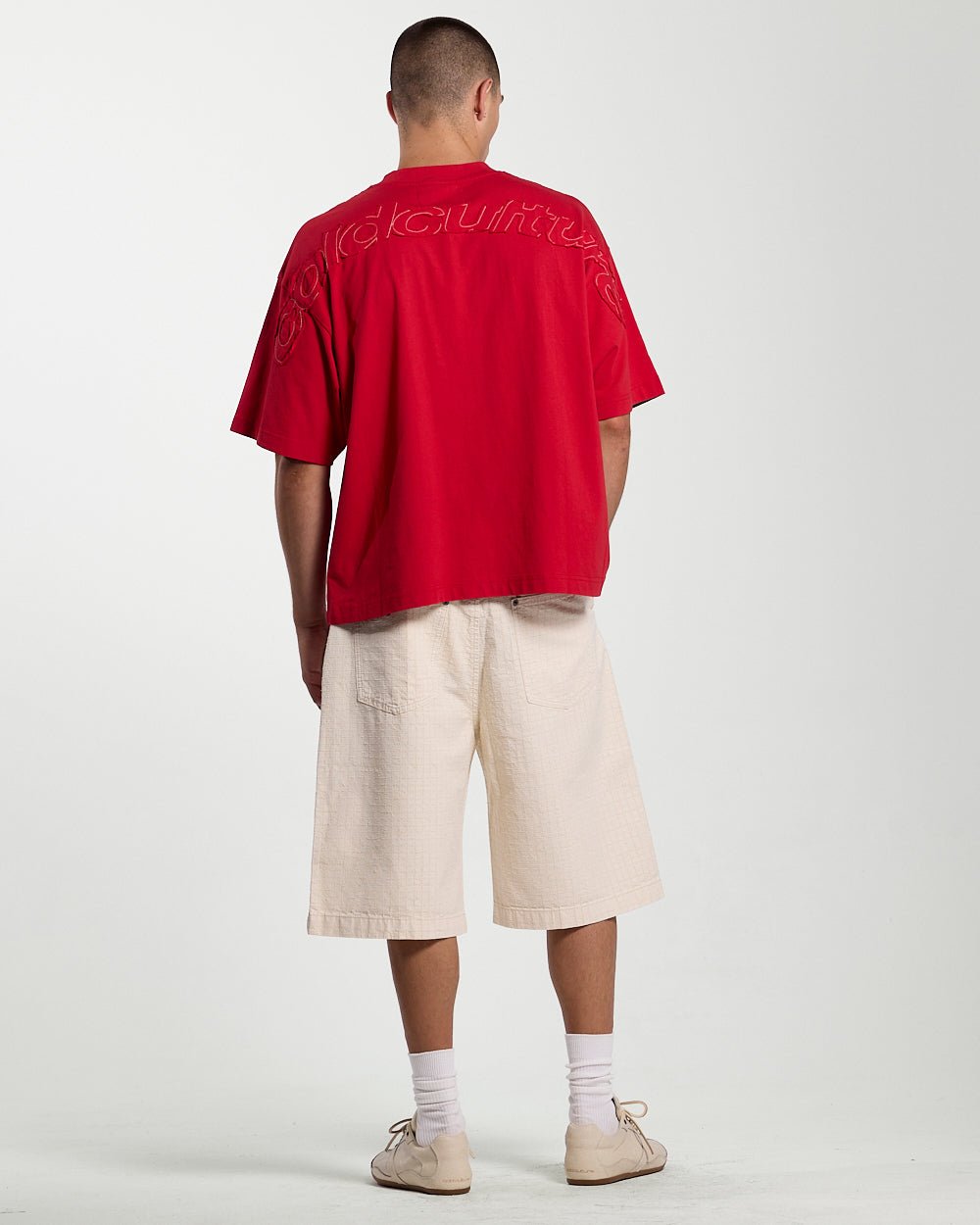 NEEDLE PUNCH SHORT WHITE - off-white textured shorts, back view on male model - Cold Culture #man
