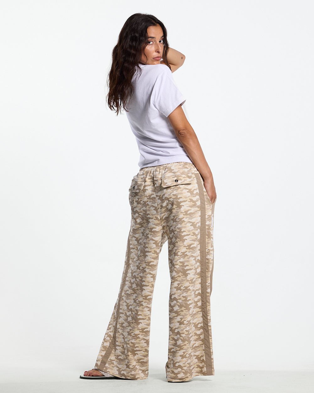 NEUTRAL FIELD SWEATPANTS CAMO - beige camo sweatpants, back view on female model - Cold Culture #woman
