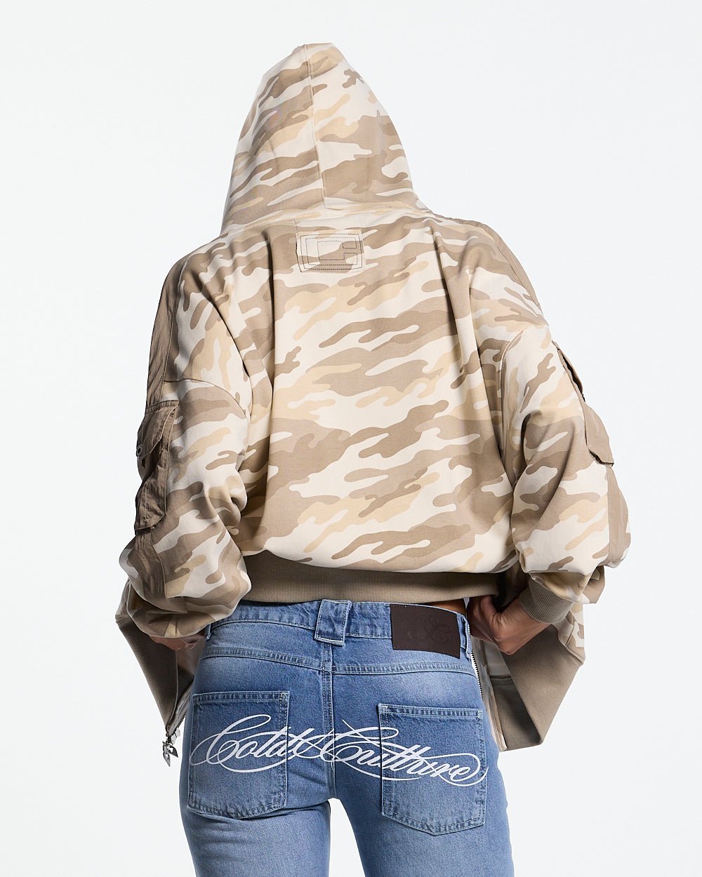NEUTRAL FIELD ZIP HOODIE CAMO - beige camo zip-up hoodie, back view on female model - Cold Culture #woman