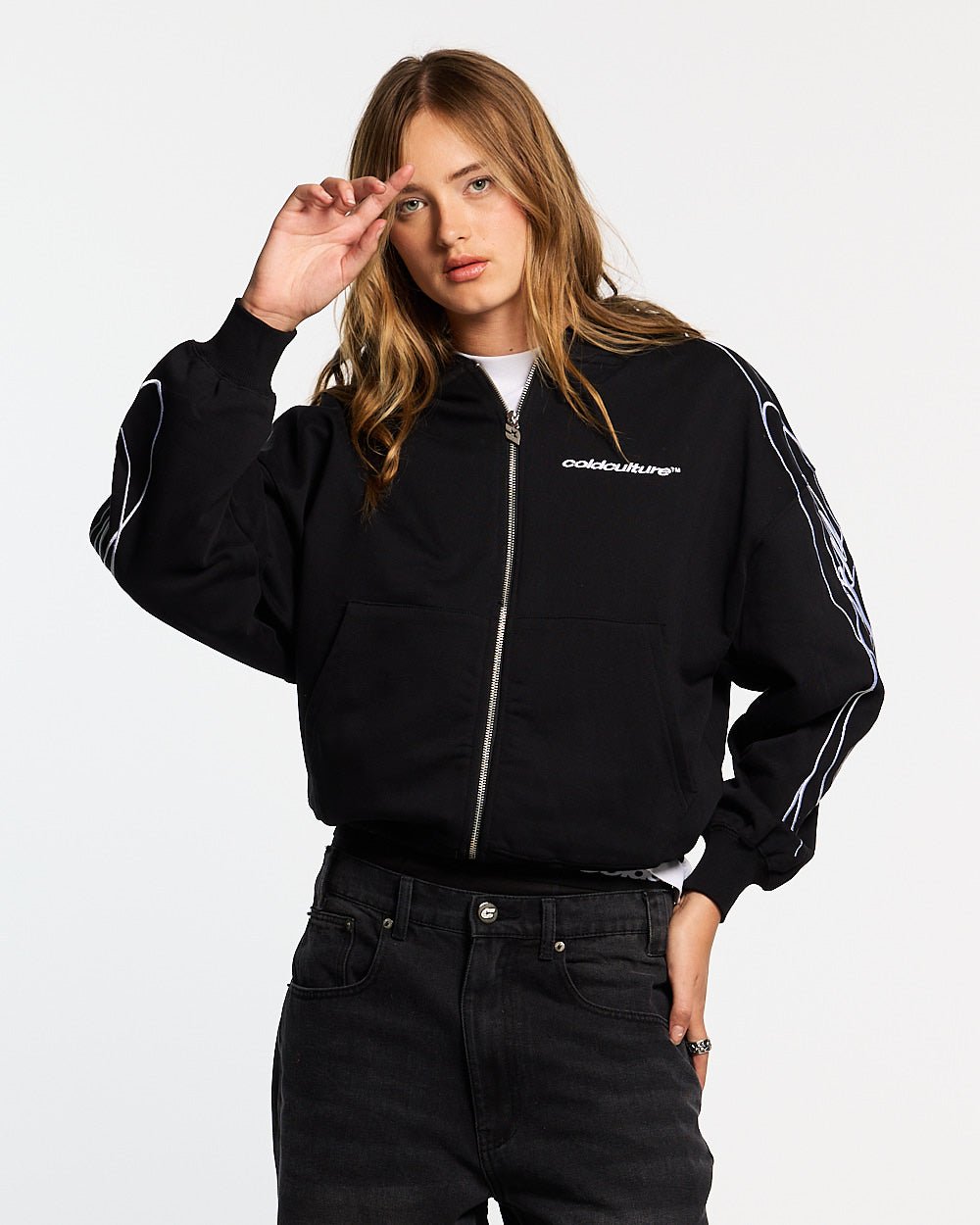 NEW SCRIPT ZIP HOODIE BLACK - black embroidered zip-up hoodie, front view on female model - Cold Culture #woman