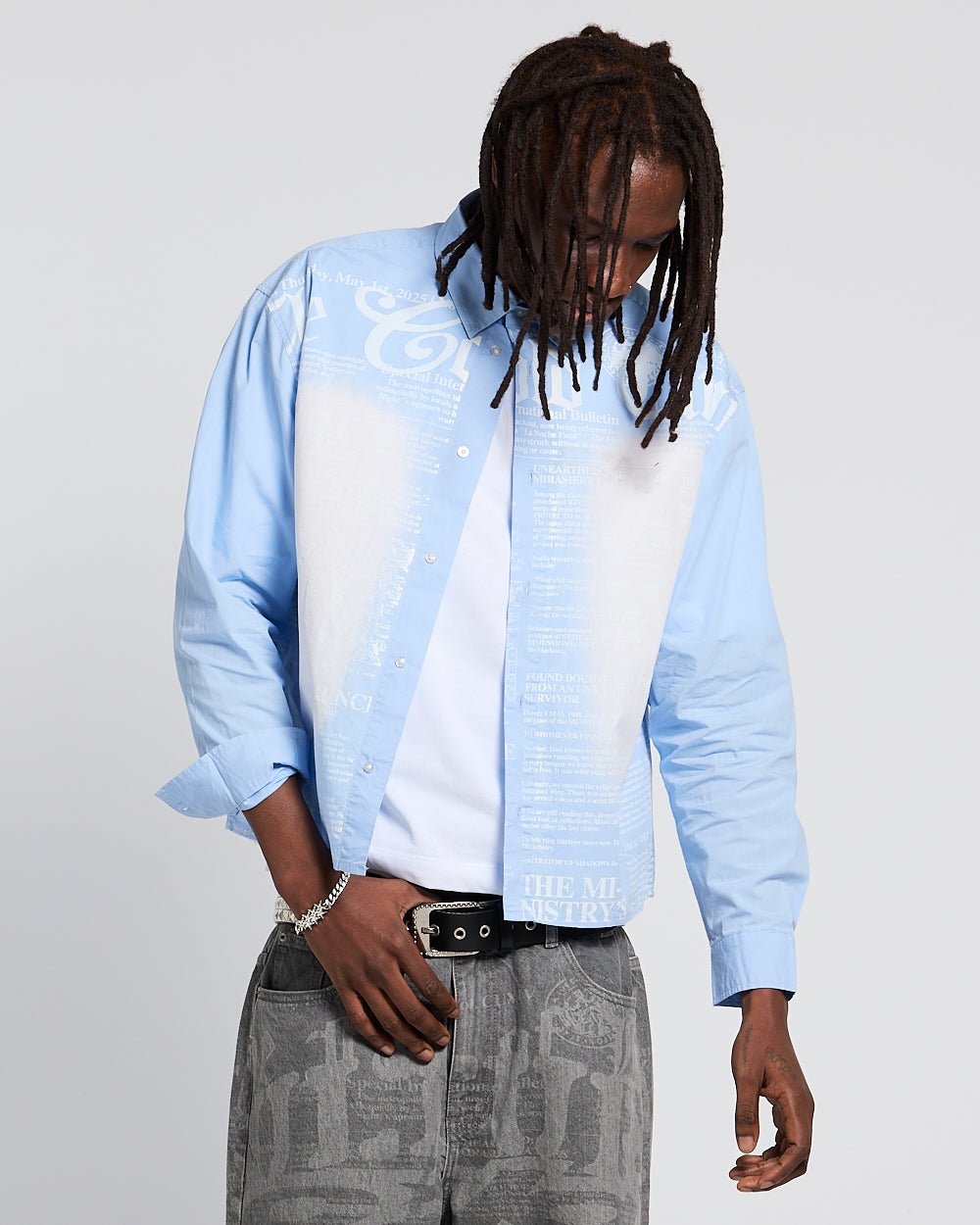 NEWSPAPER LONGSLEEVE SHIRT BABY BLUE - baby blue newspaper print shirt, front view on male model - Cold Culture #man