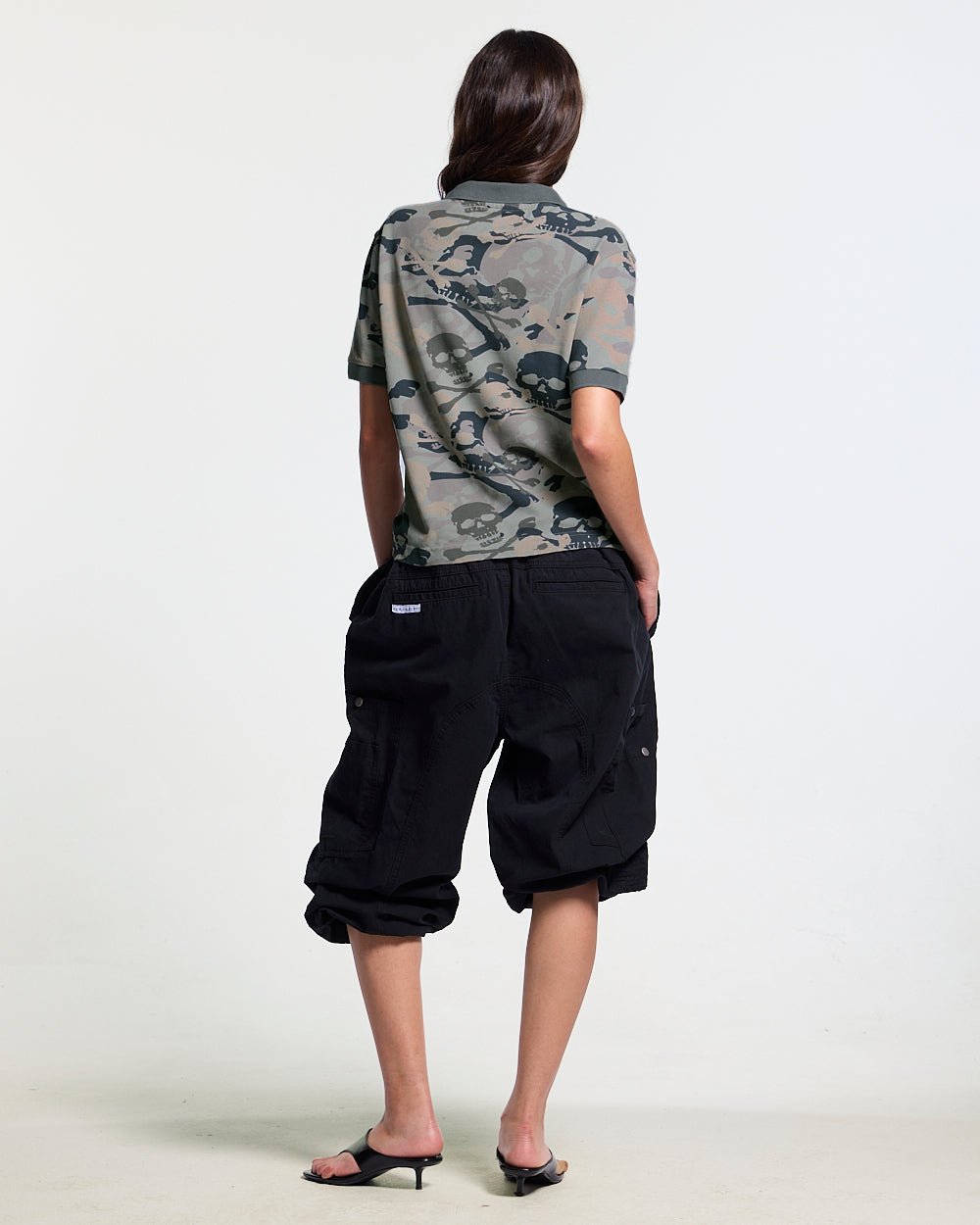 NIGHTSKULL POLO GREY - grey skull print polo shirt, back view on female model - Cold Culture #woman