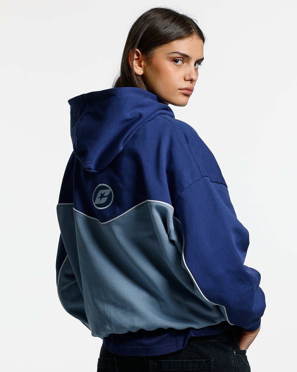 NO RISK ZIP HOODIE BLUE SCALE - two-tone blue zip-up hoodie, back view on female model - Cold Culture #woman