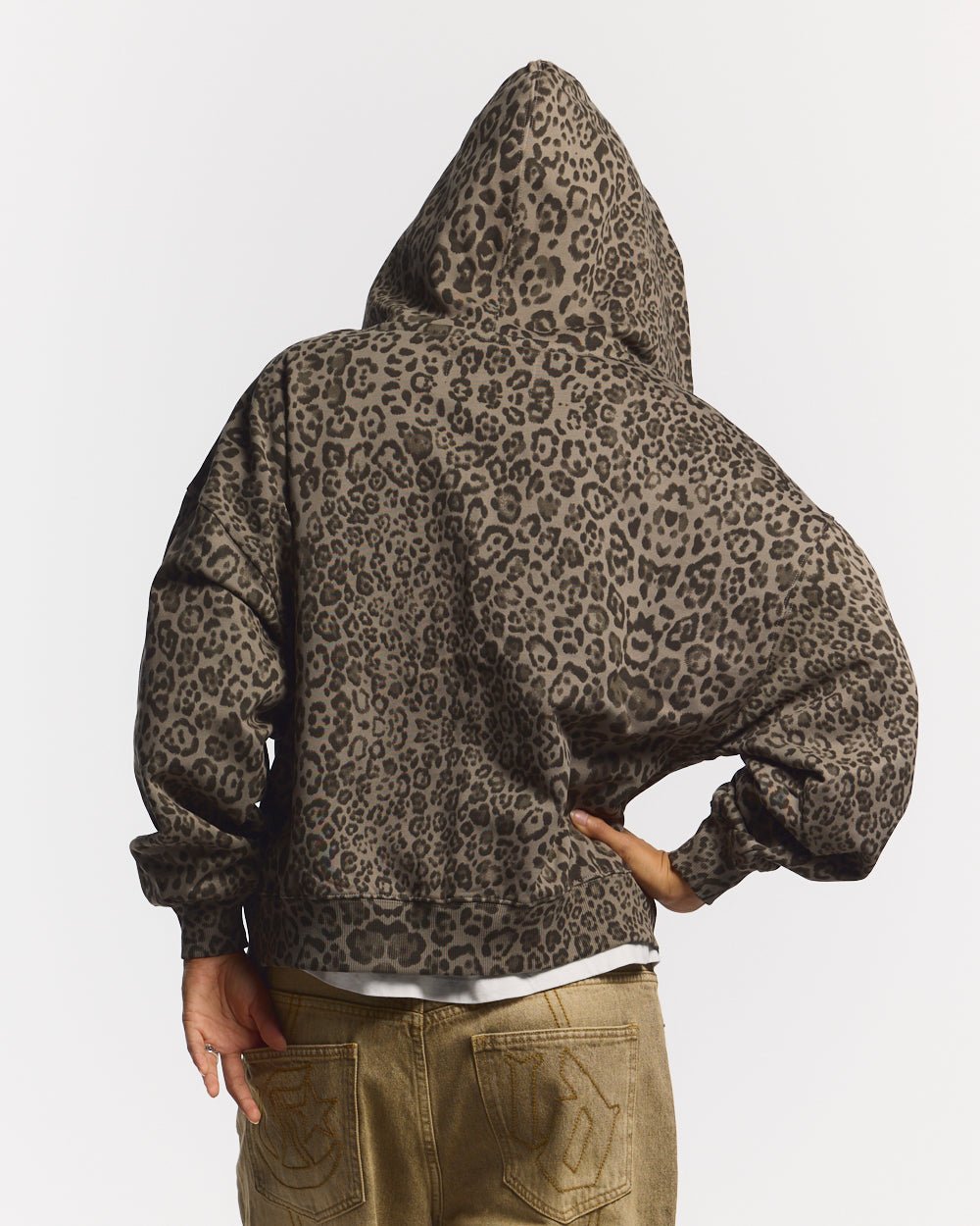 NOCTURNE BEAST ZIP HOODIE BROWN - brown leopard print zip-up hoodie, back view on female model - Cold Culture #woman