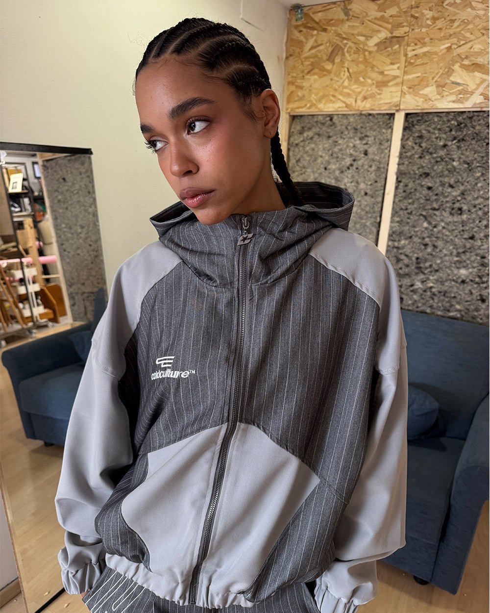 NOT FORMAL SET JACKET GREY - grey pinstripe track jacket, on model close-up - Cold Culture