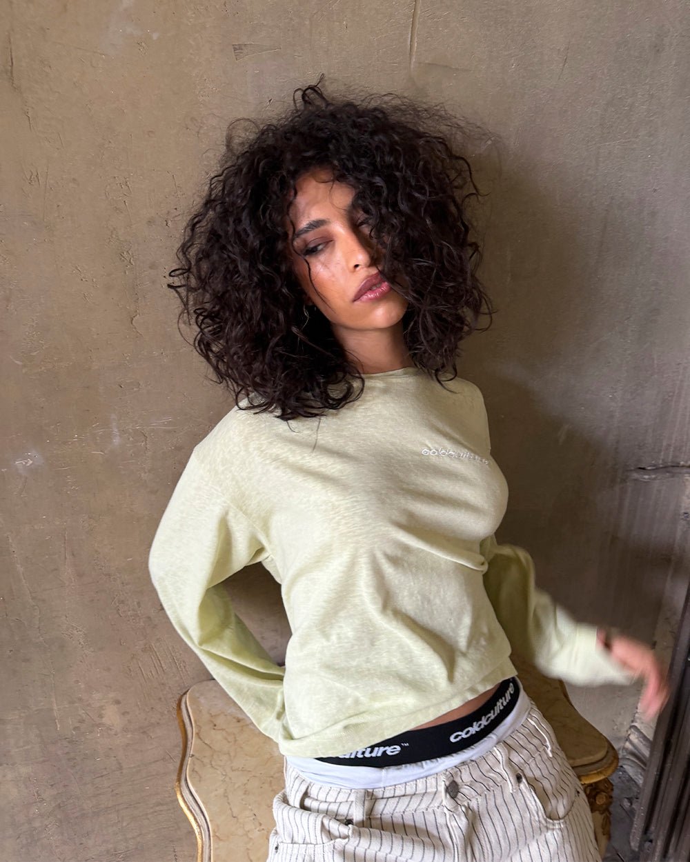 OLD SOUL LONGSLEEVE PALE YELLOW - pale yellow graphic print longsleeve tee, street style shot - Cold Culture #woman