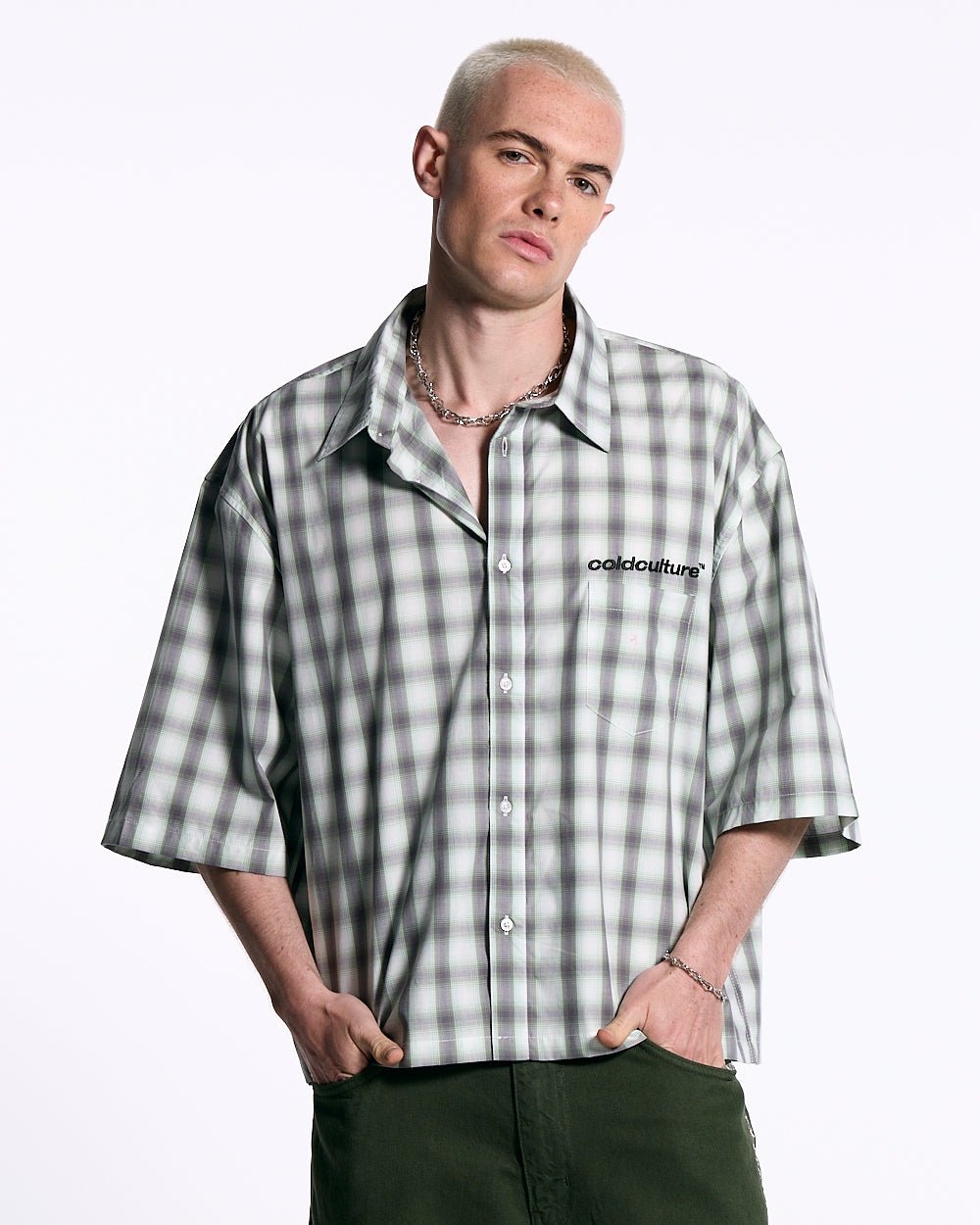 ONE POCKET SHIRT BLURRED GREEN - green checked short sleeve shirt, front view on male model - Cold Culture #man