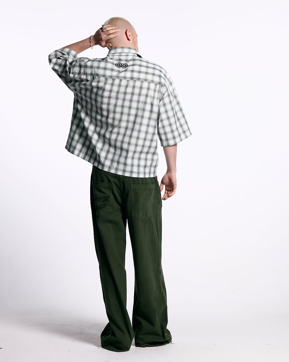 ONE POCKET SHIRT BLURRED GREEN - green checked short sleeve shirt, back view on male model - Cold Culture #man