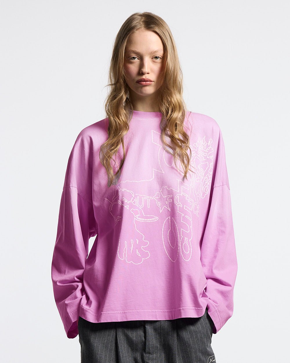 OUT OF THE OFFICE LONGSLEEVE PINK - pink graphic print longsleeve tee, front view on female model - Cold Culture #woman