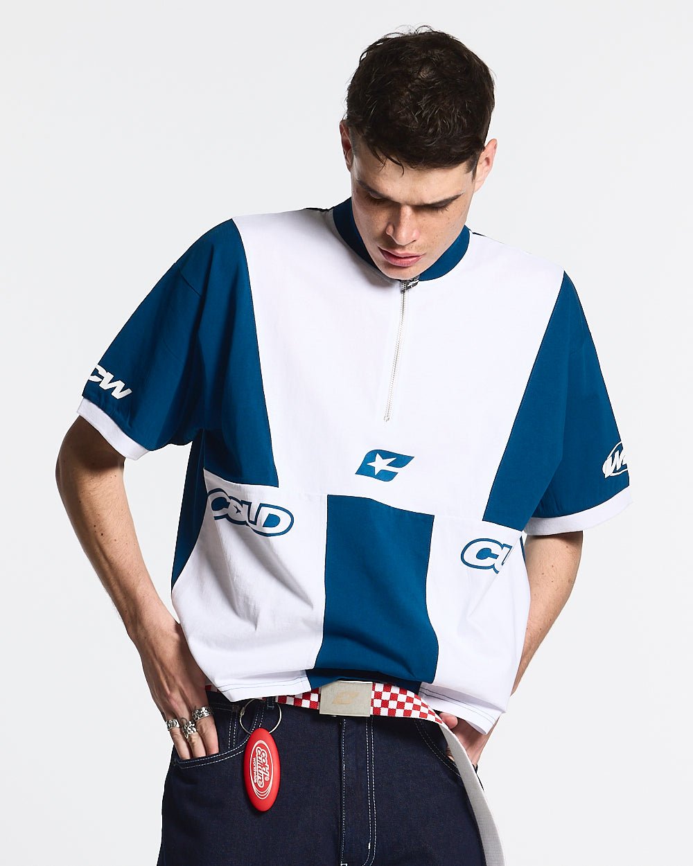 PANELS POLO TEE WHITE AND BLUE - white and blue color-block polo shirt, front view on male model - Cold Culture #man