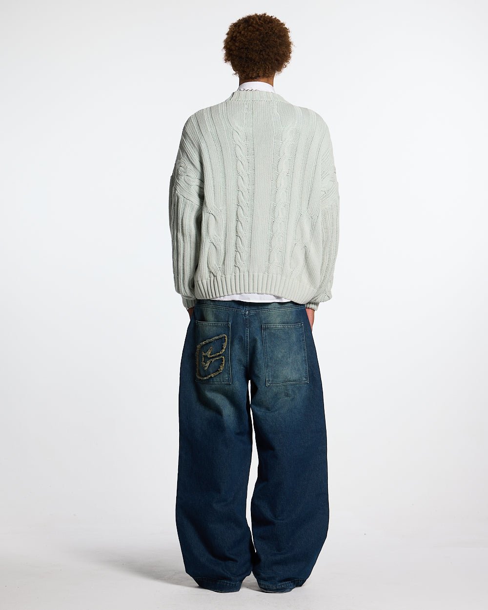 PATTERNED KNIT LIGHT BLUE - light blue cable knit sweater, back view on male model - Cold Culture #man