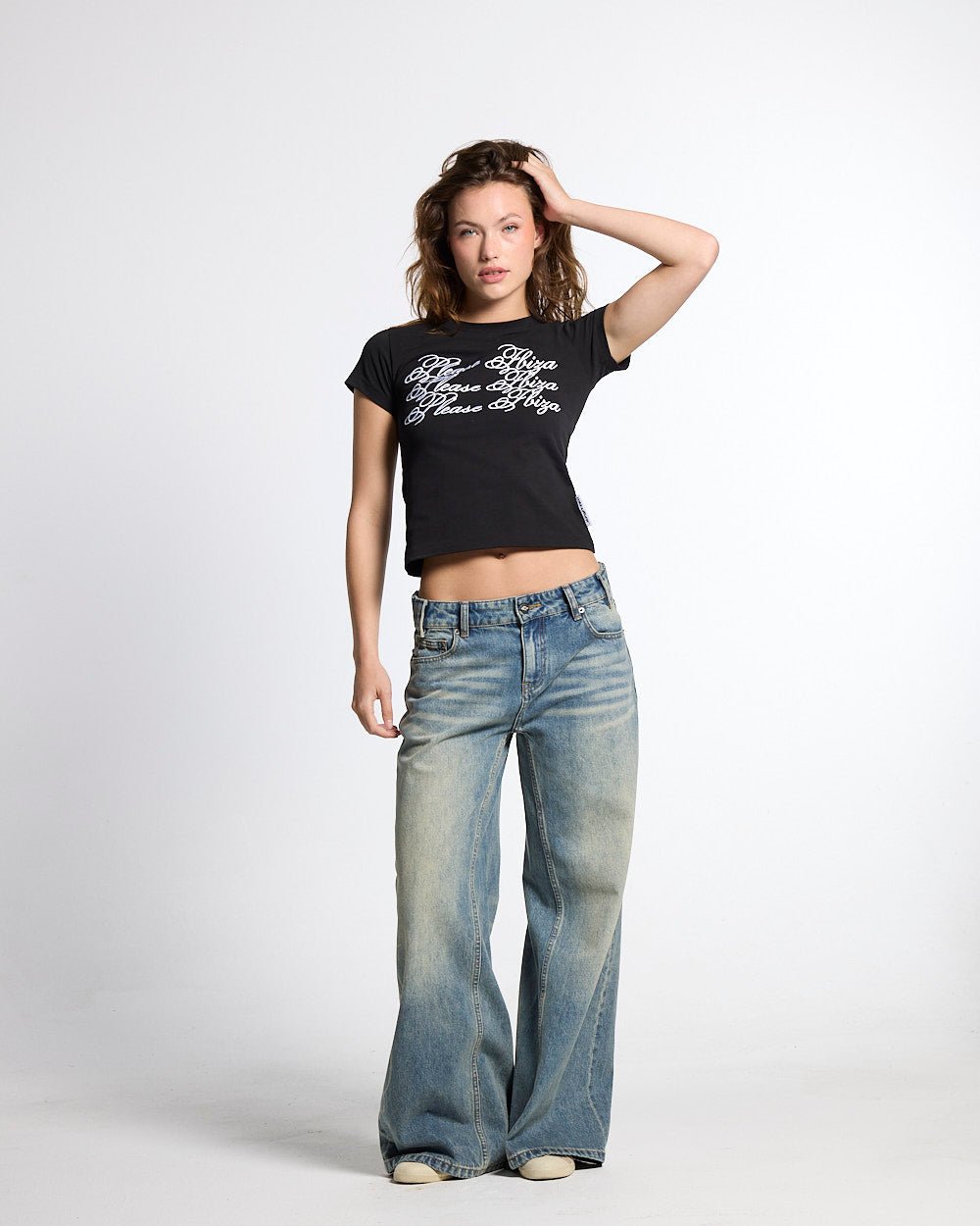 PLEASE IBIZA BABY TEE BLACK - black graphic print baby tee, front view on female model - Cold Culture #woman