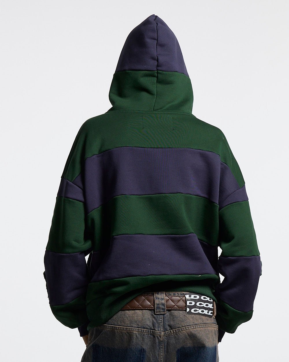 PUZZLE ZIP HOODIE GREEN & NAVY - green and navy striped zip-up hoodie, back view on female model - Cold Culture #woman