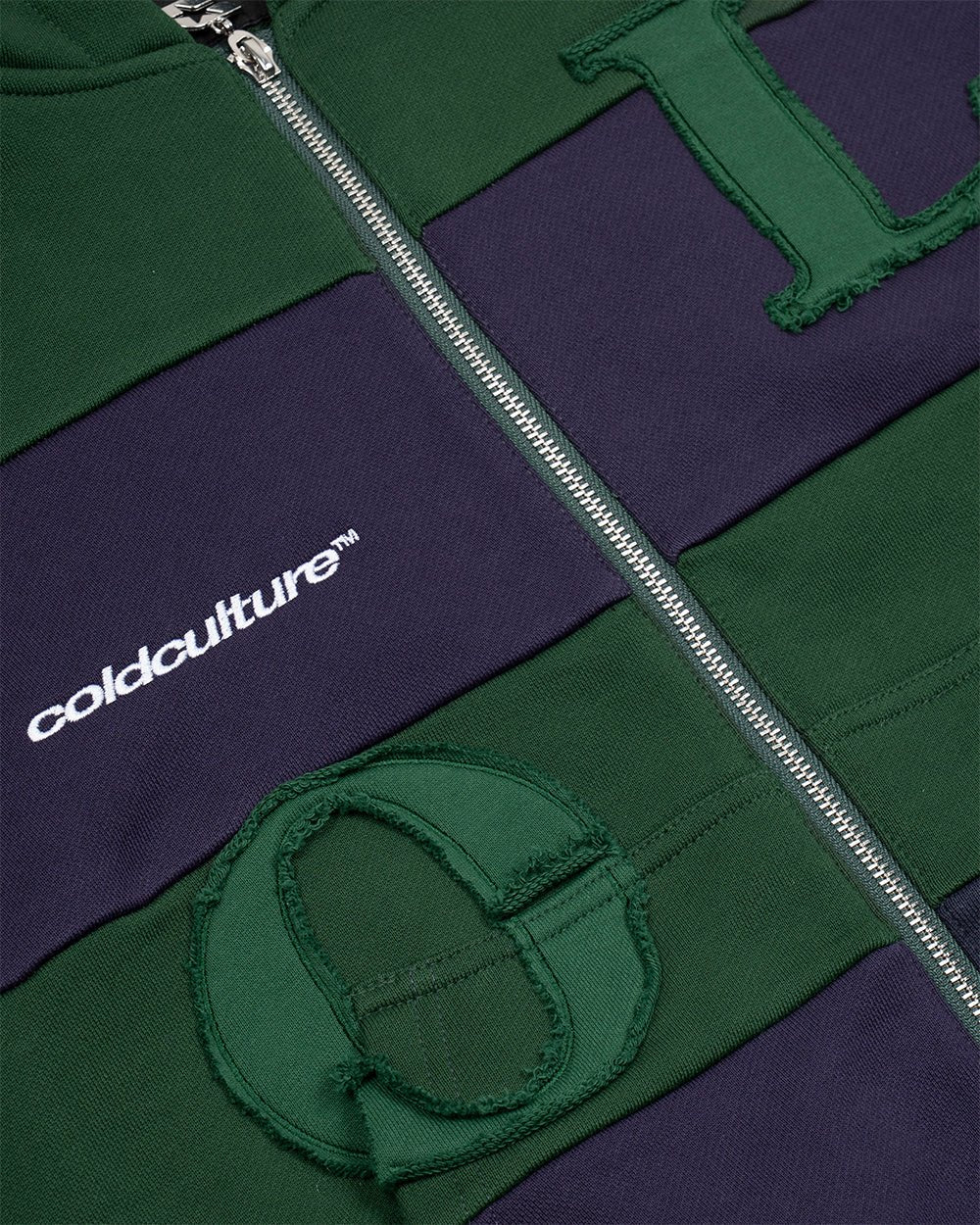 PUZZLE ZIP HOODIE GREEN & NAVY - green and navy striped zip-up hoodie, detail close-up - Cold Culture