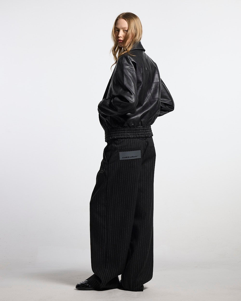 RACING JACKET BLACK - black leather jacket, back view on female model - Cold Culture #woman