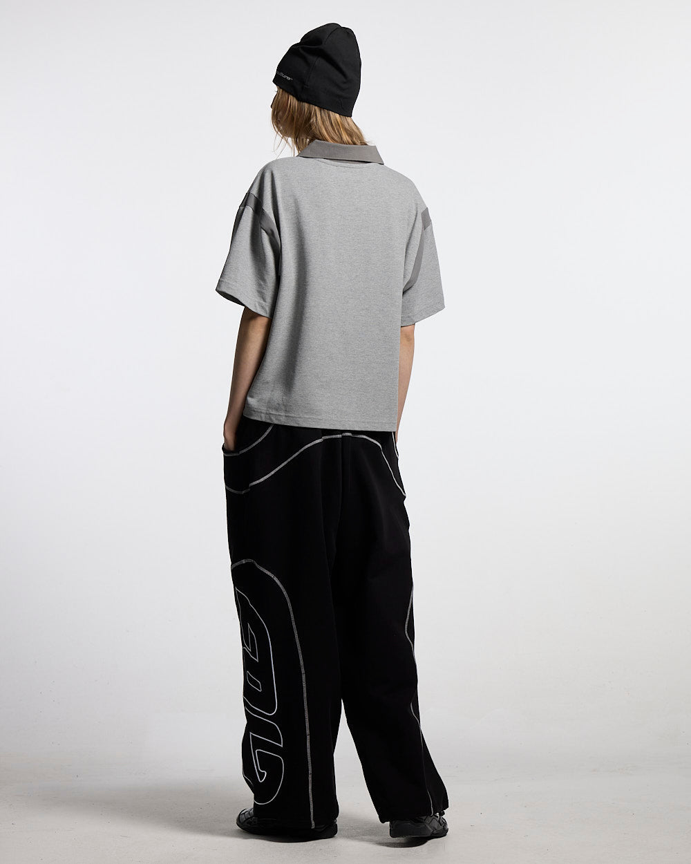 RAW CITY POLO GREY - heather grey polo shirt, back view on female model - Cold Culture #woman