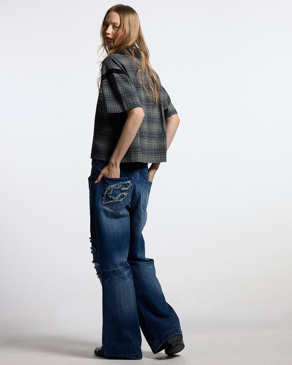 RAW CITY POLO TARTAN - grey tartan polo shirt, back view on female model - Cold Culture #woman