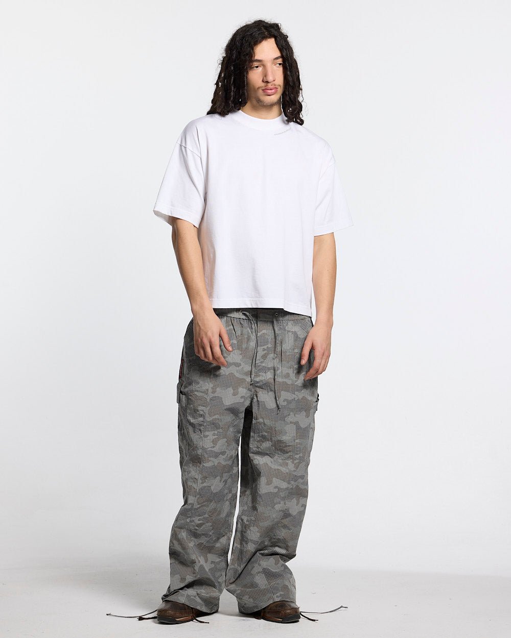 RESERVED CARGO PANTS CAMO - grey camo cargo pants, front view on male model - Cold Culture #man