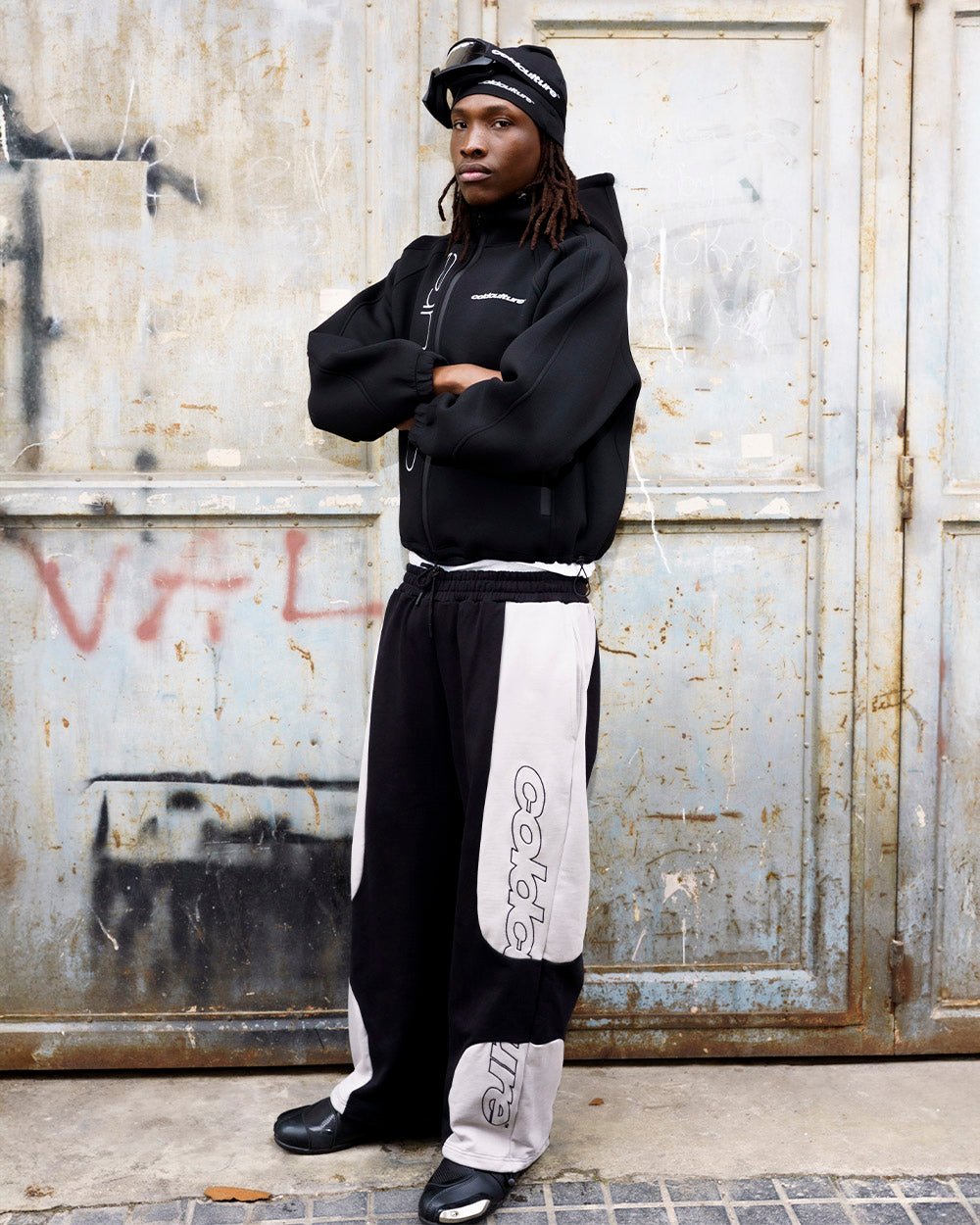 RIDER SWEATPANTS BLACK & GREY - black and grey paneled sweatpants, street style shot - Cold Culture