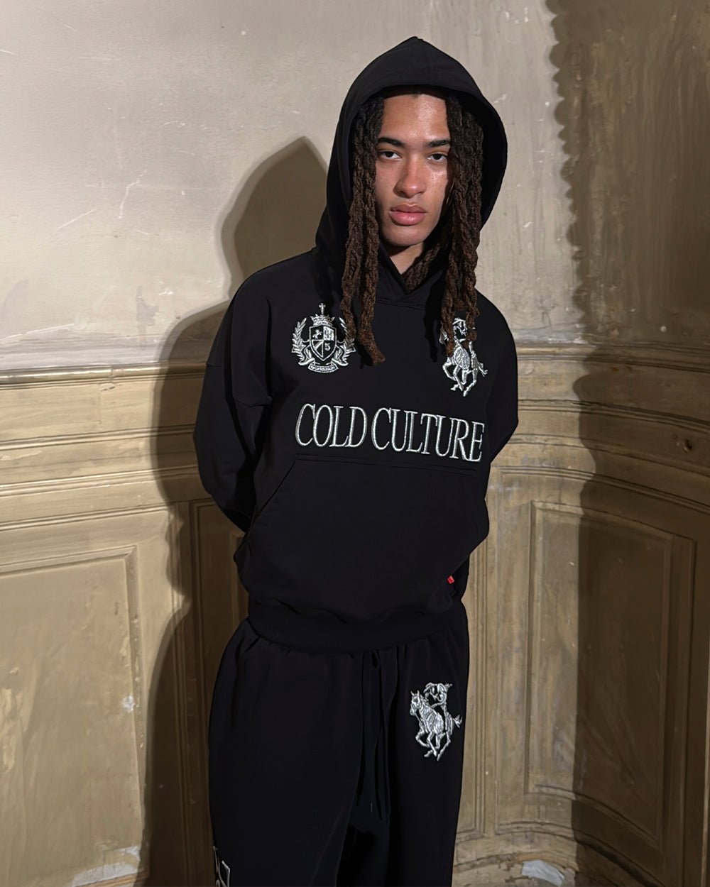 RIDING CLUB HOODIE BLACK - black embroidered hoodie, street style shot - Cold Culture