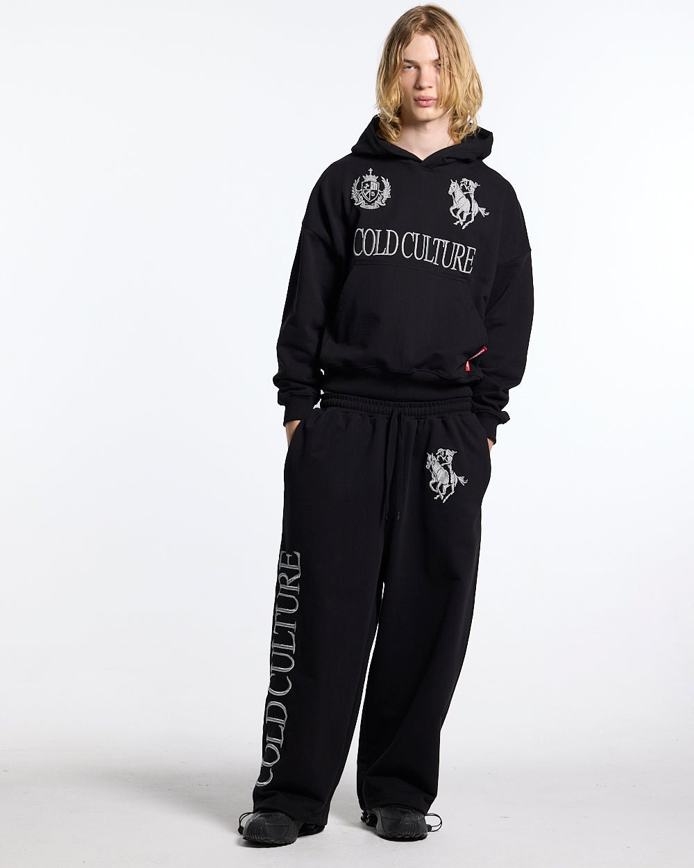 RIDING CLUB HOODIE BLACK - black embroidered hoodie, front view on male model - Cold Culture #man