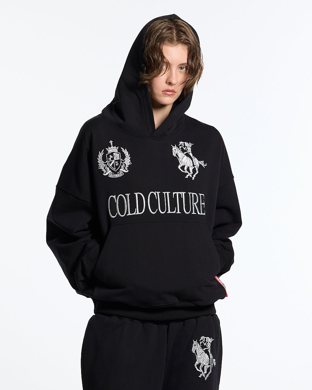 RIDING CLUB HOODIE BLACK - black embroidered hoodie, front view on female model - Cold Culture #woman