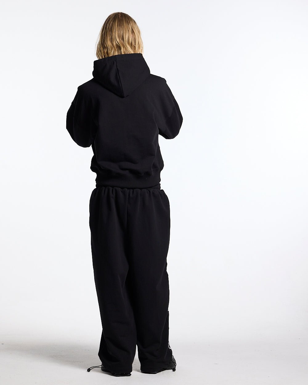 RIDING CLUB HOODIE BLACK - black embroidered hoodie, back view on male model - Cold Culture