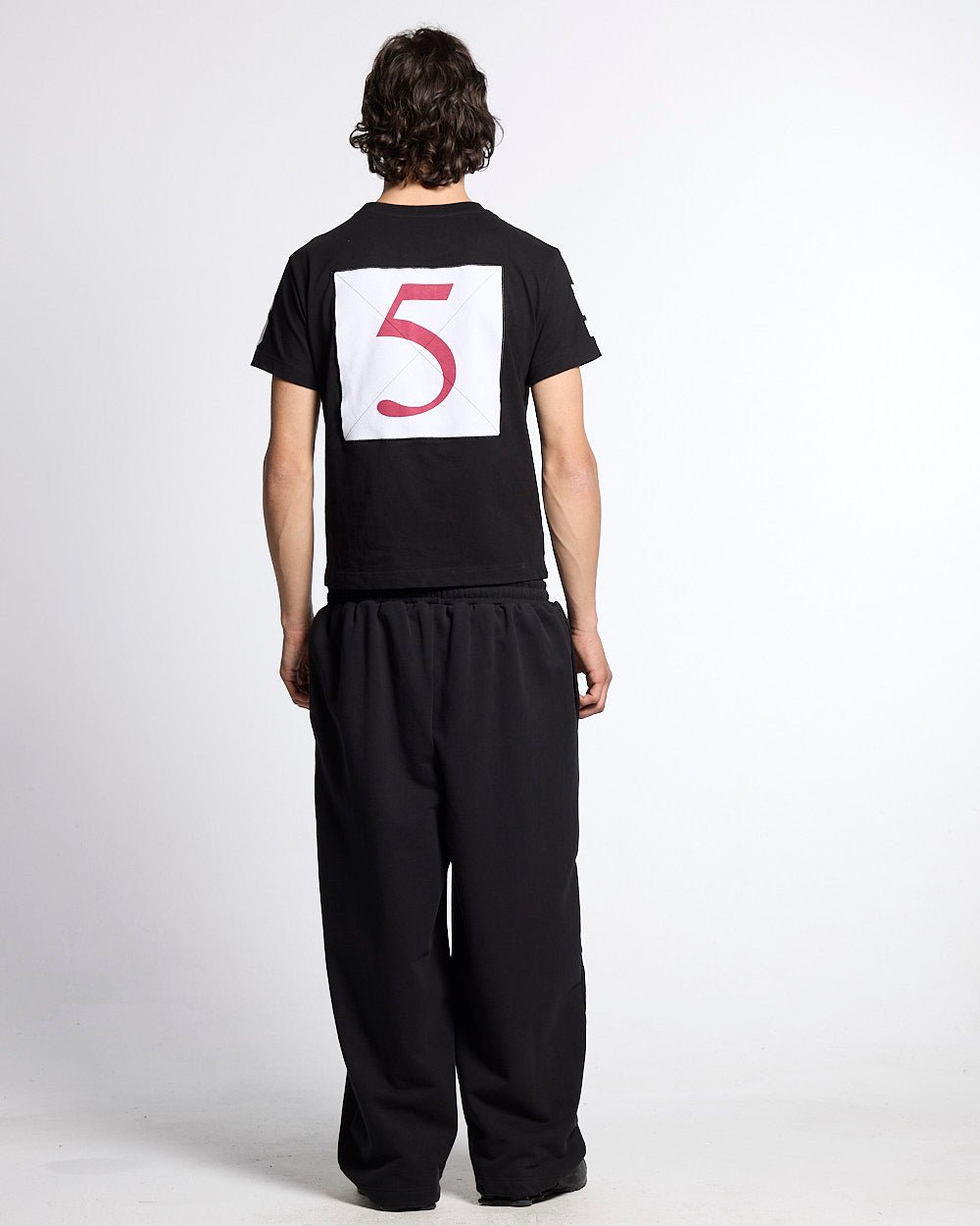 RIDING CLUB TEE BLACK - black polo rider print tee, back view on male model - Cold Culture #man
