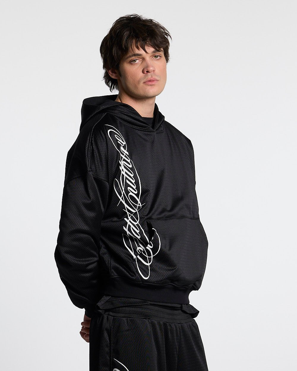 RIOT MESH HOODIE BLACK - black mesh hoodie, front view on male model - Cold Culture #man